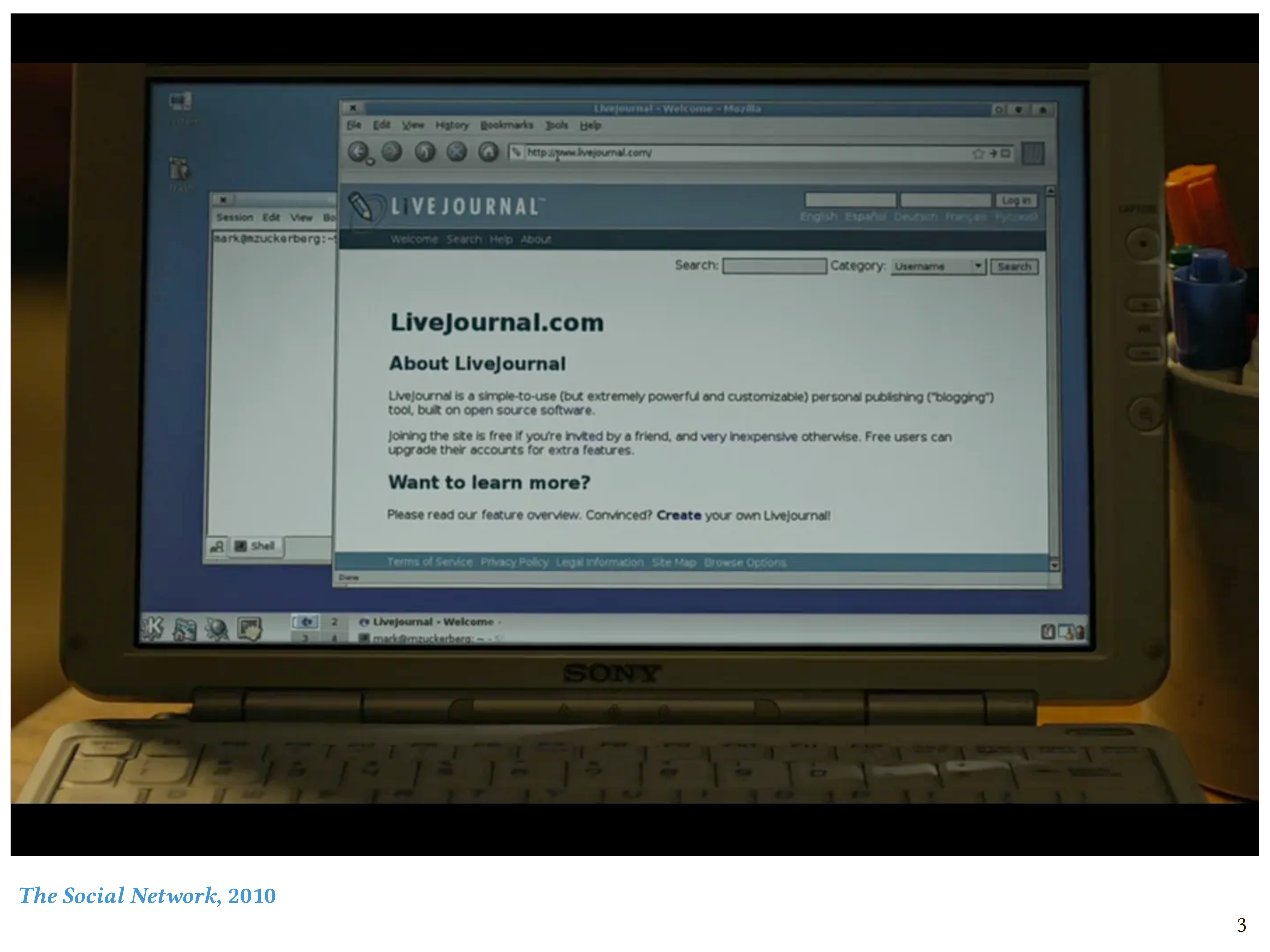 Another frame from _The Social Network_: Mark's open laptop, showing the home page of LiveJournal, circa 2003.